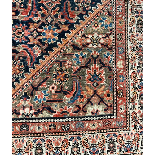 302 - ANTIQUE MALAYER RUG, 193cm x 137cm.