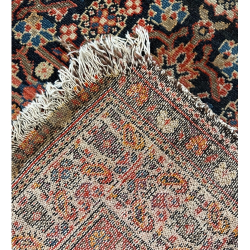 302 - ANTIQUE MALAYER RUG, 193cm x 137cm.