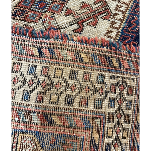 303 - ANTIQUE QASHQAI RUG, 175cm x 131cm.