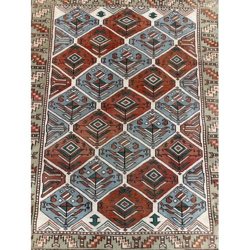 304 - ANTIQUE CAUCASIAN RUG, 141cm x 121cm.