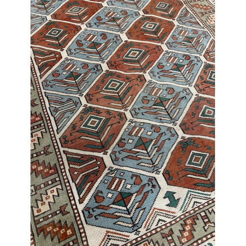 304 - ANTIQUE CAUCASIAN RUG, 141cm x 121cm.