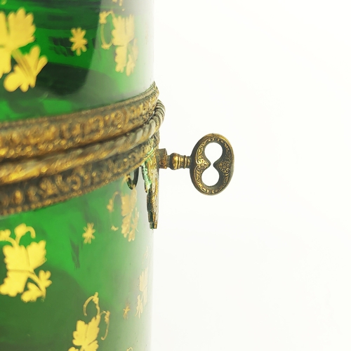 31 - BRISTOL EMERALD GLASS LIDDED CASKET, gold leaf motif decoration, oval form, twin handles, 10cm H.