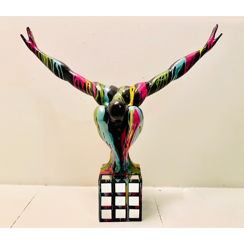 450 - CONTEMPORARY SCHOOL DIVER SCULPTURE, polychrome paint splattered finish on a mirrored base, 81cm H x... 