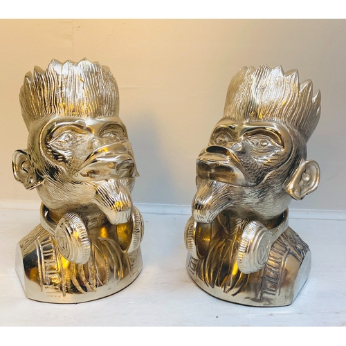 452 - MONKEY DJ BOTTLE HOLDERS, a pair, polished metal, 35cm H x 20cm x 27cm. (2)