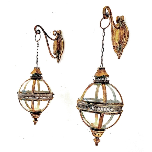 455 - WALL HANGING GLOBE LANTERNS, a pair, Regency style, gilt metal and glass, 80cm H x 25cm x 25cm. (2)