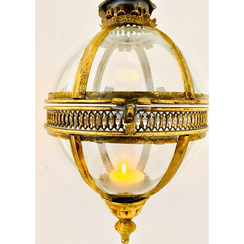 455 - WALL HANGING GLOBE LANTERNS, a pair, Regency style, gilt metal and glass, 80cm H x 25cm x 25cm. (2)