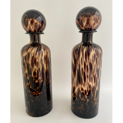 465 - DECANTERS, a pair, Murano style faux tortoiseshell glass, 40cm H x 10cm x 10cm. (2)