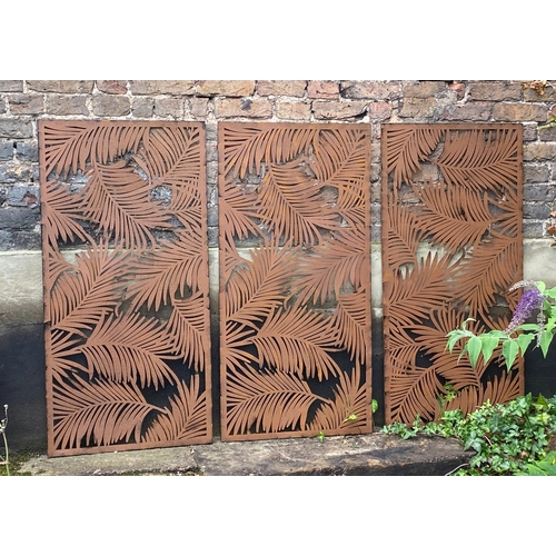 476 - ARCHITECTURAL GARDEN PANELS, a set of three, metal with palm leaf design, each panel 120cm H x 60cm.... 