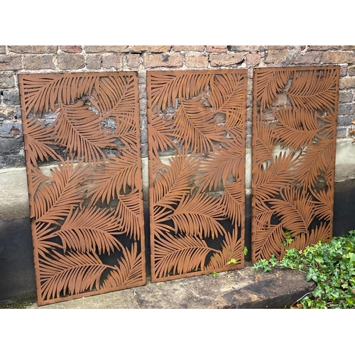 476 - ARCHITECTURAL GARDEN PANELS, a set of three, metal with palm leaf design, each panel 120cm H x 60cm.... 