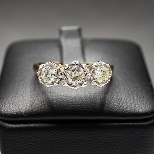 5 - AN 18CT WHITE AND YELLOW GOLD RING, set with three round brilliant cut diamonds, VS, diamonds 0.65ct... 