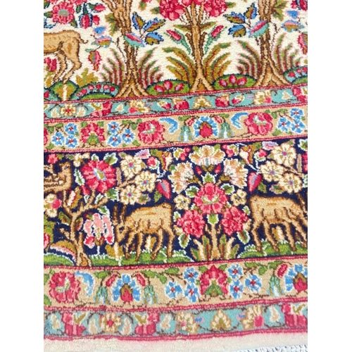 101 - ANTIQUE PERSIAN KERMAN LAVER CARPET, 390cm x 275cm.