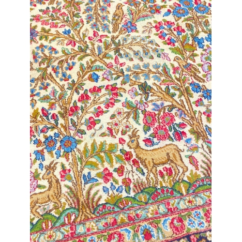 101 - ANTIQUE PERSIAN KERMAN LAVER CARPET, 390cm x 275cm.