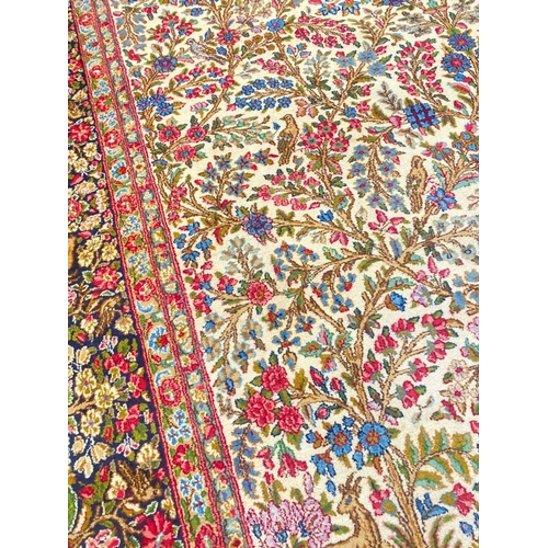 101 - ANTIQUE PERSIAN KERMAN LAVER CARPET, 390cm x 275cm.