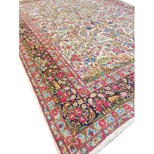 101 - ANTIQUE PERSIAN KERMAN LAVER CARPET, 390cm x 275cm.