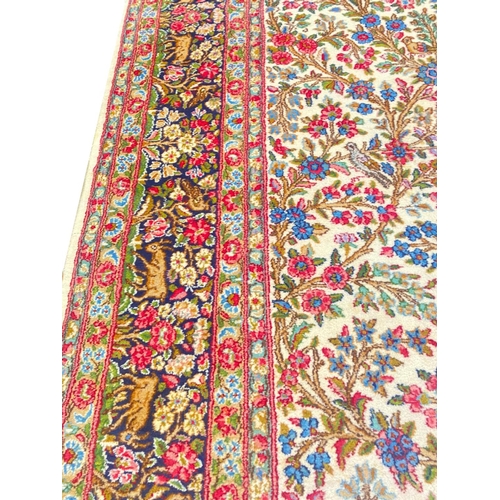 101 - ANTIQUE PERSIAN KERMAN LAVER CARPET, 390cm x 275cm.