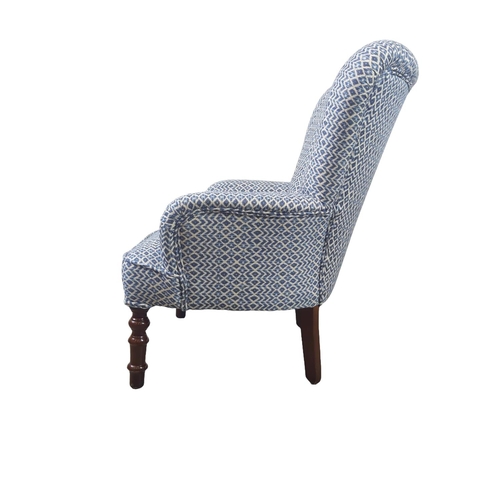 122 - ARMCHAIR, blue patterned upholstery, 84cm H x 68cm W x 75cm D.