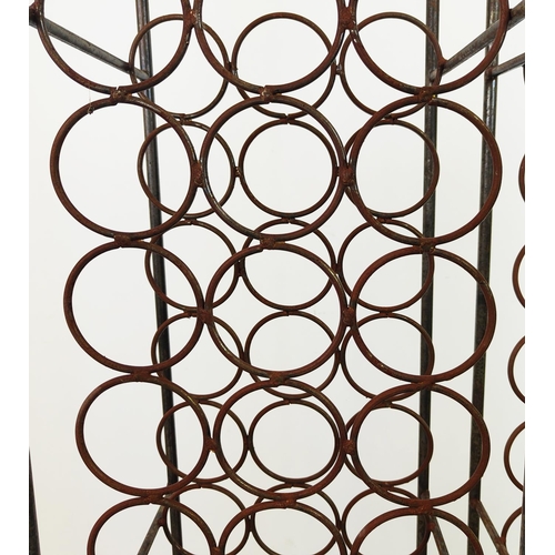 125 - WINE RACKS, a pair, wrought iron, each for thirty bottles, 132cm H x 36cm W x 34cm D. (2)