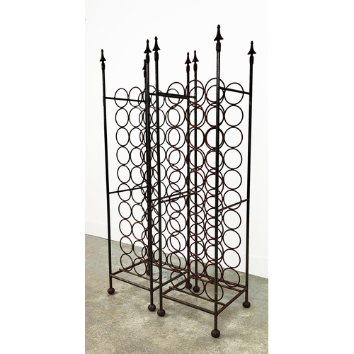 125 - WINE RACKS, a pair, wrought iron, each for thirty bottles, 132cm H x 36cm W x 34cm D. (2)