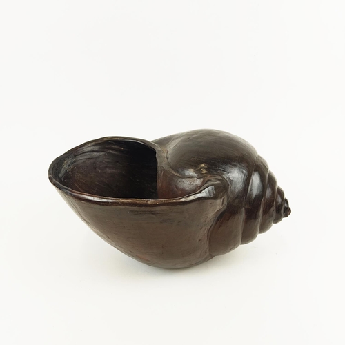 16 - A MODELLED TERRACOTTA SNAIL SHELL, 25cm high.