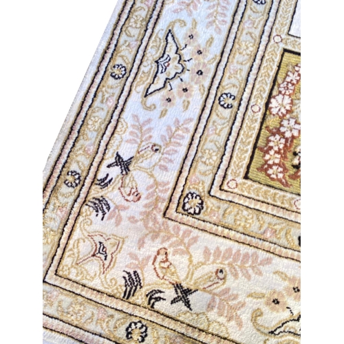 99 - FINE PURE SILK AND METAL THREAD HEREKE RUG, 240cm x 154cm.