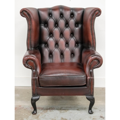 291 - WING ARMCHAIR, Georgian style burgundy leather, 101cm H x 80cm x 84cm. (imperfections)