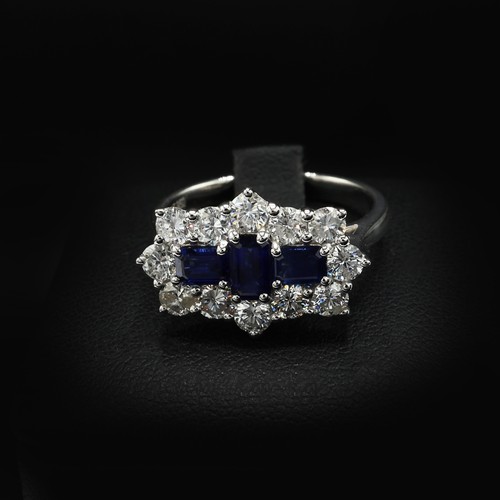 27 - Platinum sapphire and diamond boat-style dress ring. Sapphires 0.92ct. RBC diamonds 1.15ct.