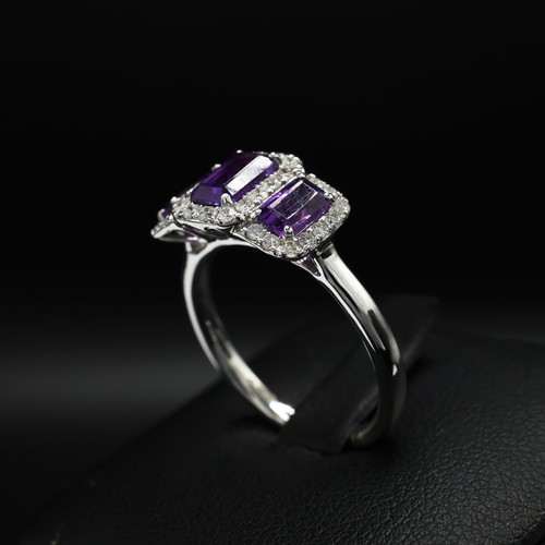 21 - 9ct white gold triple cluster dress ring set with step cut amethysts surrounded by RBC diamonds. Ame... 