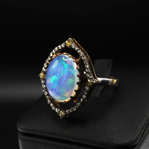 30 - Silver gilt dress ring set with oval cabochon opal and yellow rose cut diamonds and white rose cut d... 