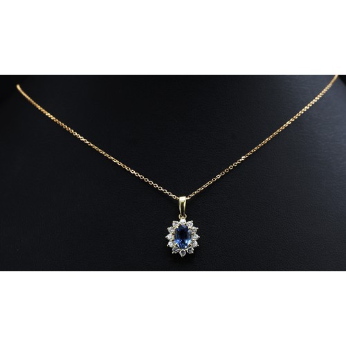 22 - 18ct white gold oval sapphire and RBC diamond cluster pendant on an 18ct white gold chain, boxed. Sa... 