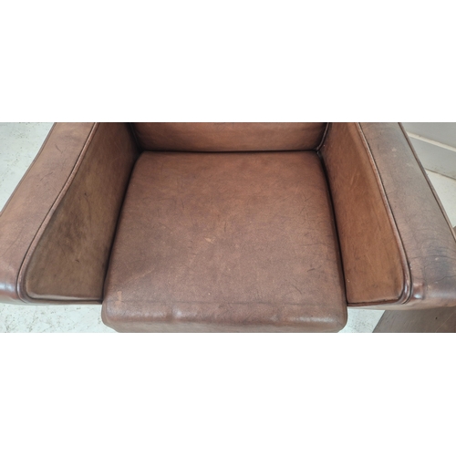 282 - ARMCHAIRS, a pair, mid 20th century brown leather, 86cm H x 62cm x 68cm. (2)