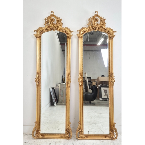 478 - PIER MIRRORS, a pair, Belle Epoque style, bevelled plates with ornate gilt frames, 176cm H x 55cm. (... 