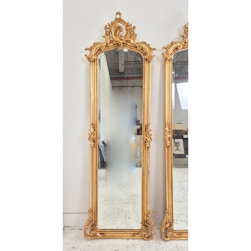 478 - PIER MIRRORS, a pair, Belle Epoque style, bevelled plates with ornate gilt frames, 176cm H x 55cm. (... 