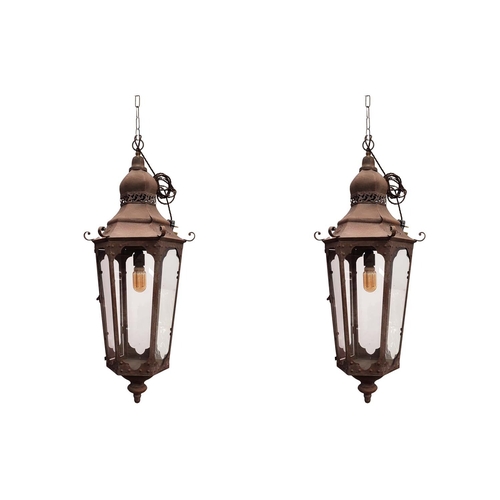 515 - A PAIR OF HANGING WALL LANTERN LIGHTS, antiqued oxidised frames, hexagonal frames, 75cm H. (2)