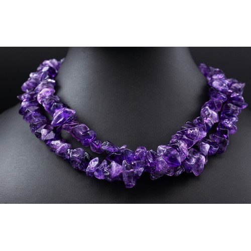 78 - AN AMETHYST SINGLE STRAND NECKLACE, an amethyst bracelet and a pair of amethyst and diamond pendant ... 