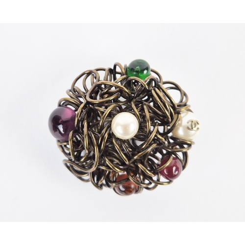 13 - CHANEL BROOCH, bronze tone metal with encrusted faux pearls and stones, with safety pin closure, wit... 