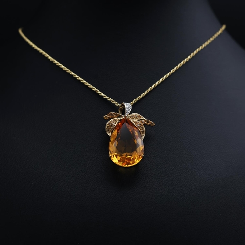 137 - A stunning 9ct yellow gold large pear-shaped citrine pendant with further accent citrines and diamon... 