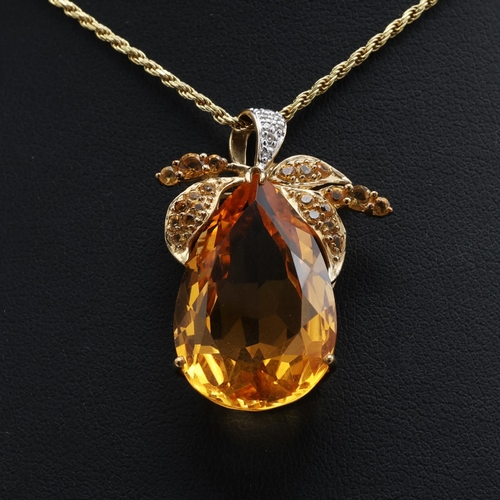 137 - A stunning 9ct yellow gold large pear-shaped citrine pendant with further accent citrines and diamon... 