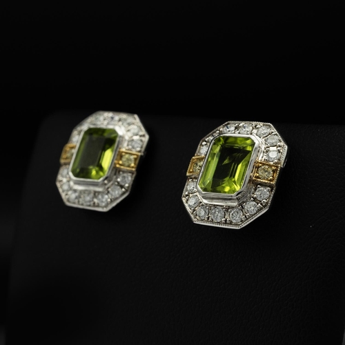 141 - Certificated pair of 18ct white and yellow gold earrings set with octagonal cut peridots and RBC dia... 