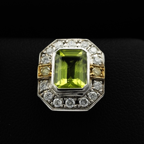 141 - Certificated pair of 18ct white and yellow gold earrings set with octagonal cut peridots and RBC dia... 