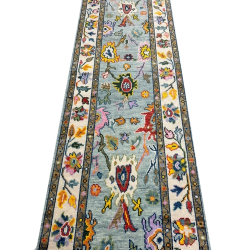 262 - CONTEMPORARY OUSHAK LONG RUNNER, 487cm x 81cm.