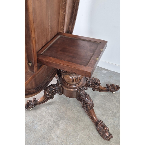 299 - LOO TABLE, Victorian walnut, circa 1850, quarter veneered burr top with leaf carved frieze raised on... 