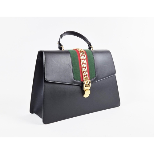 3 - GUCCI SYLVIE BAG, black leather with iconic web stripes and gold tone chain detailing on front flap,... 