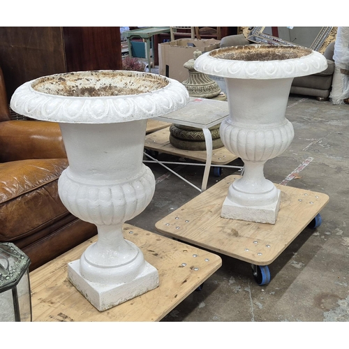 302 - GARDEN URNS, a pair, white painted iron, each 57cm W x 82cm H.