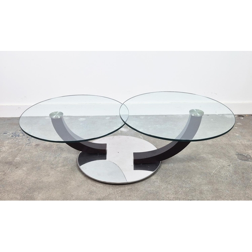 303 - COFFEE TABLE, two glass circles, swivel action, each circle 70cm diam.