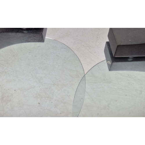 303 - COFFEE TABLE, two glass circles, swivel action, each circle 70cm diam.