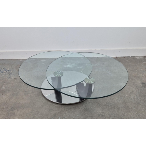 303 - COFFEE TABLE, two glass circles, swivel action, each circle 70cm diam.