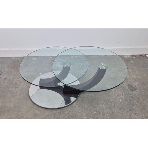 303 - COFFEE TABLE, two glass circles, swivel action, each circle 70cm diam.