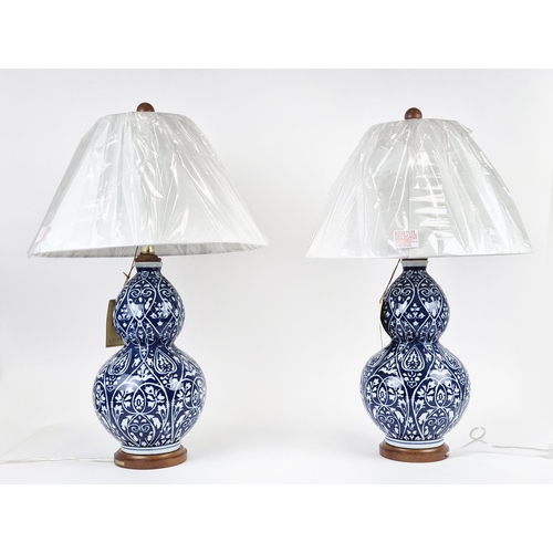 34 - LAUREN RALPH LAUREN HOME TABLE LAMPS, a pair, double gourd form, blue and white ceramic with shades,... 