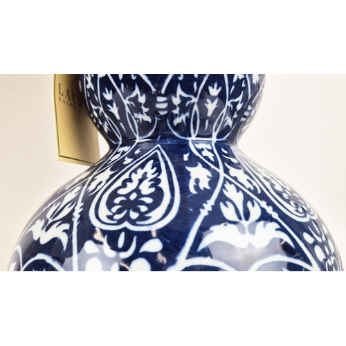 34 - LAUREN RALPH LAUREN HOME TABLE LAMPS, a pair, double gourd form, blue and white ceramic with shades,... 