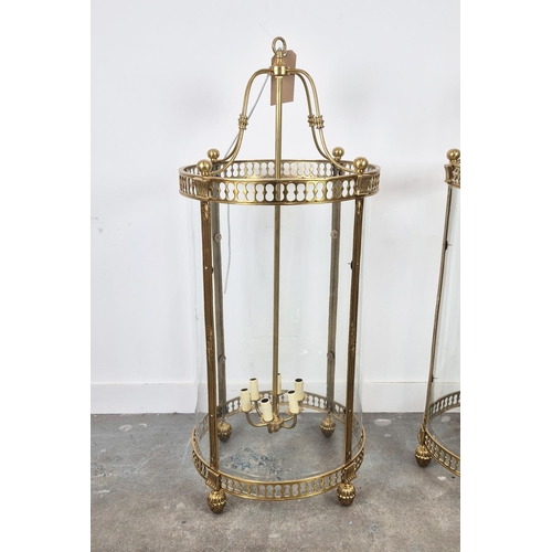 351 - CYLINDRICAL HALL LANTERNS, a pair, of large scale, gilt brass and glass, 130cm H x 55cm W. (2)